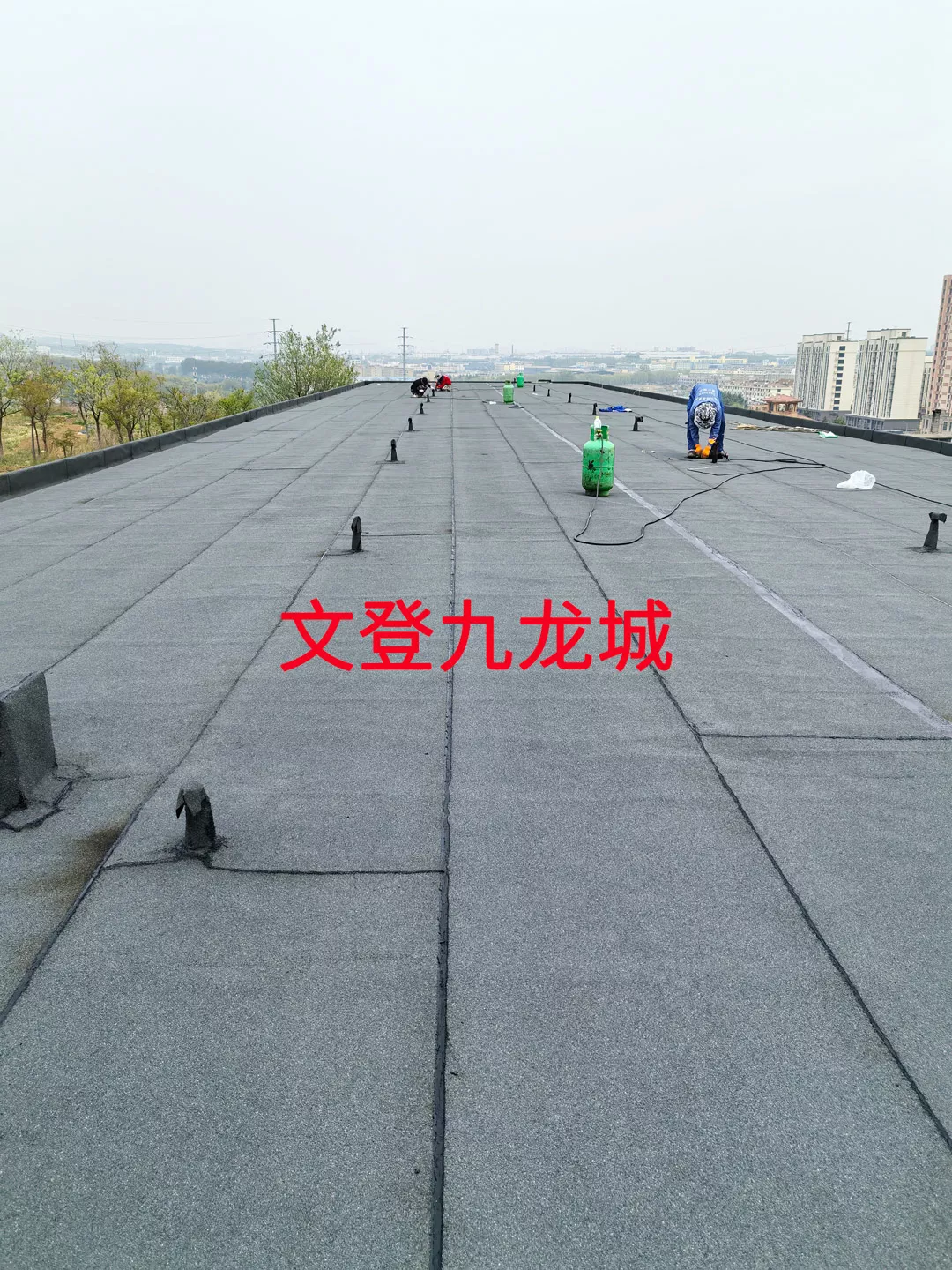 文登九龙城防水工程施工现场